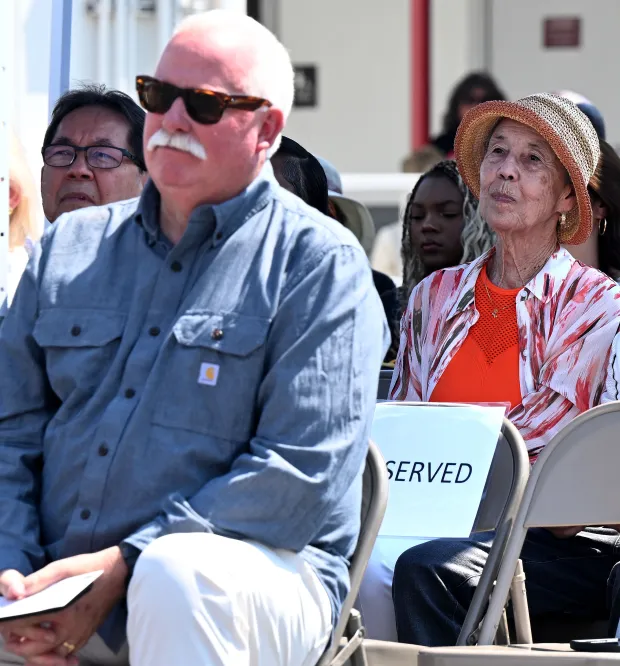 Community members at the dedication ceremony